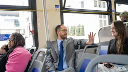 Nashville Mayor Freddie O’Connell talking to residents on a transit bus. Nashville Mayor Freddie O’Connell talking to residents on a transit bus.