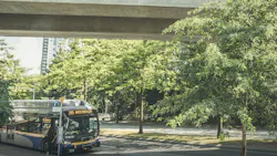 TransLink bus pulls up to bus stop TransLink bus pulls up to bus stop