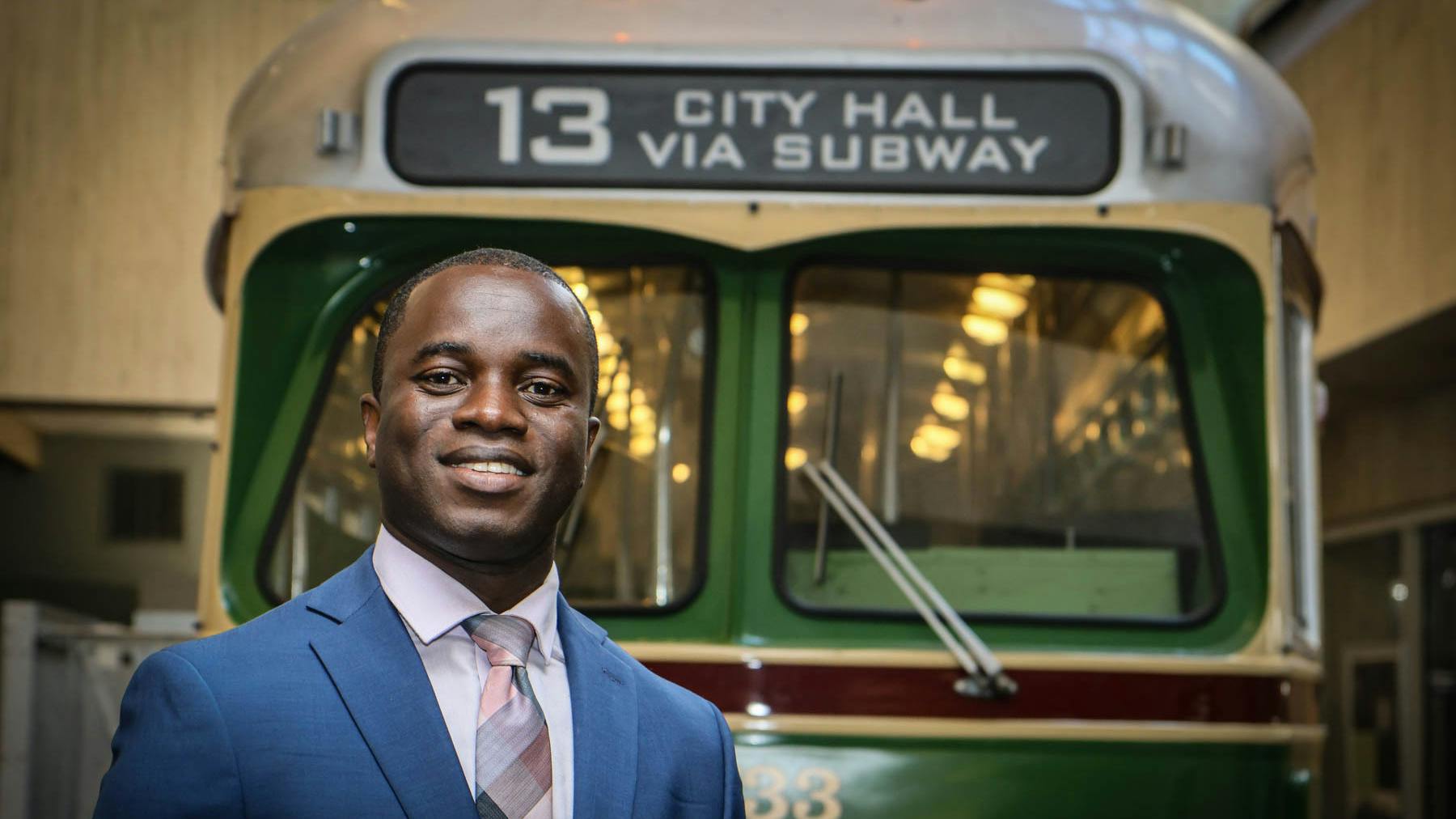 Philip Asabere in front of a SEPTA train.