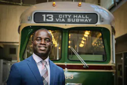 Philip Asabere in front of a SEPTA train. Philip Asabere in front of a SEPTA train.