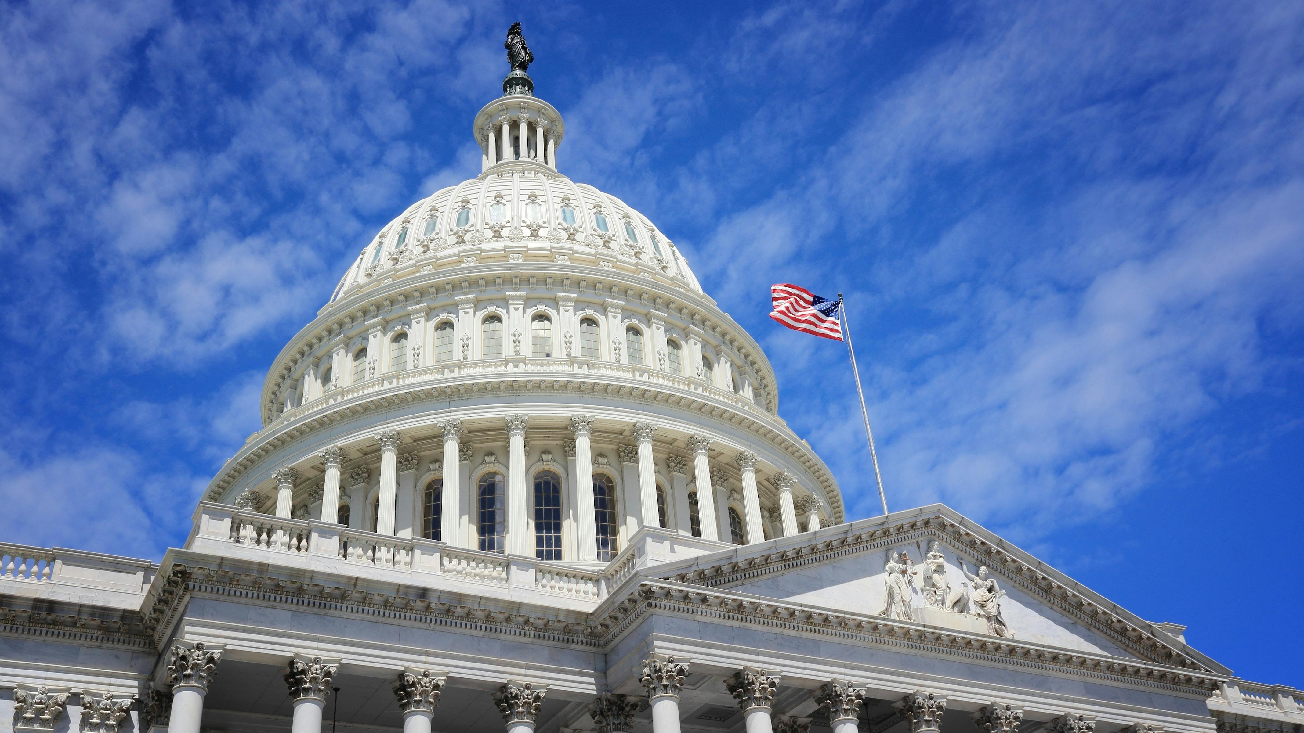 U.S. Capitol Building with a blue sky in the background