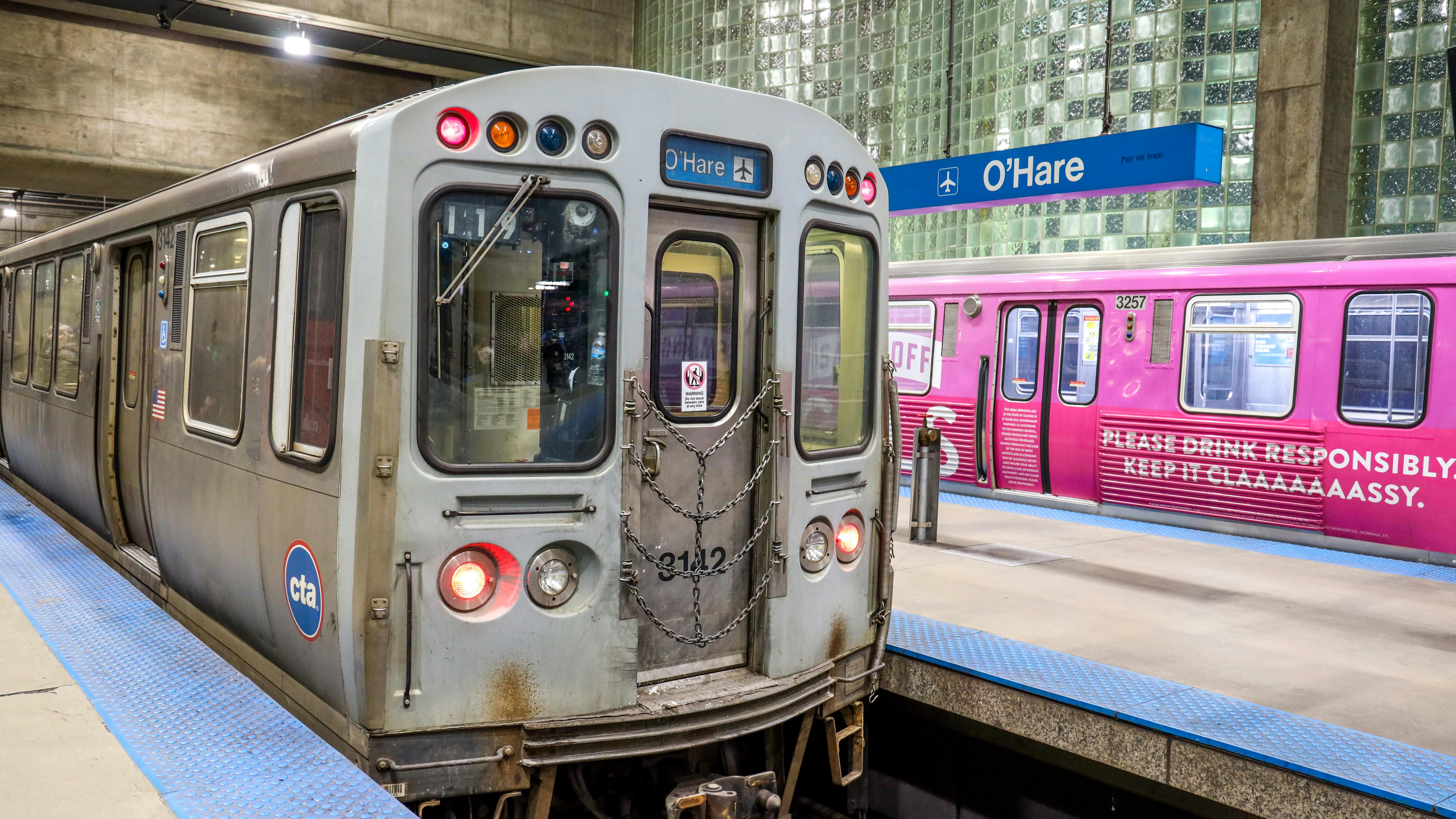 CTA blue line train sits at the O'Hare station
