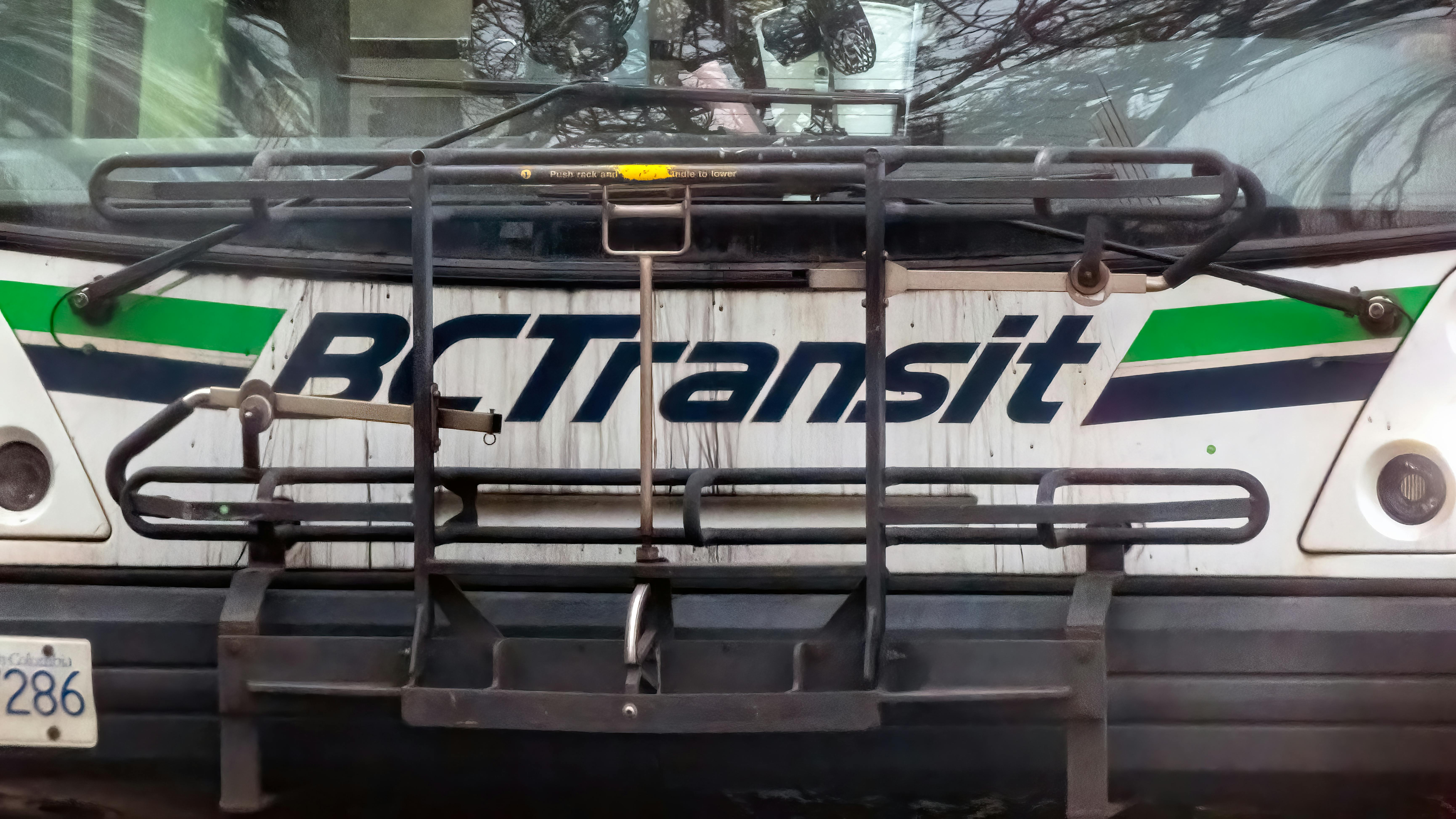 A close crop in on the front logo of a BC Transit bus.