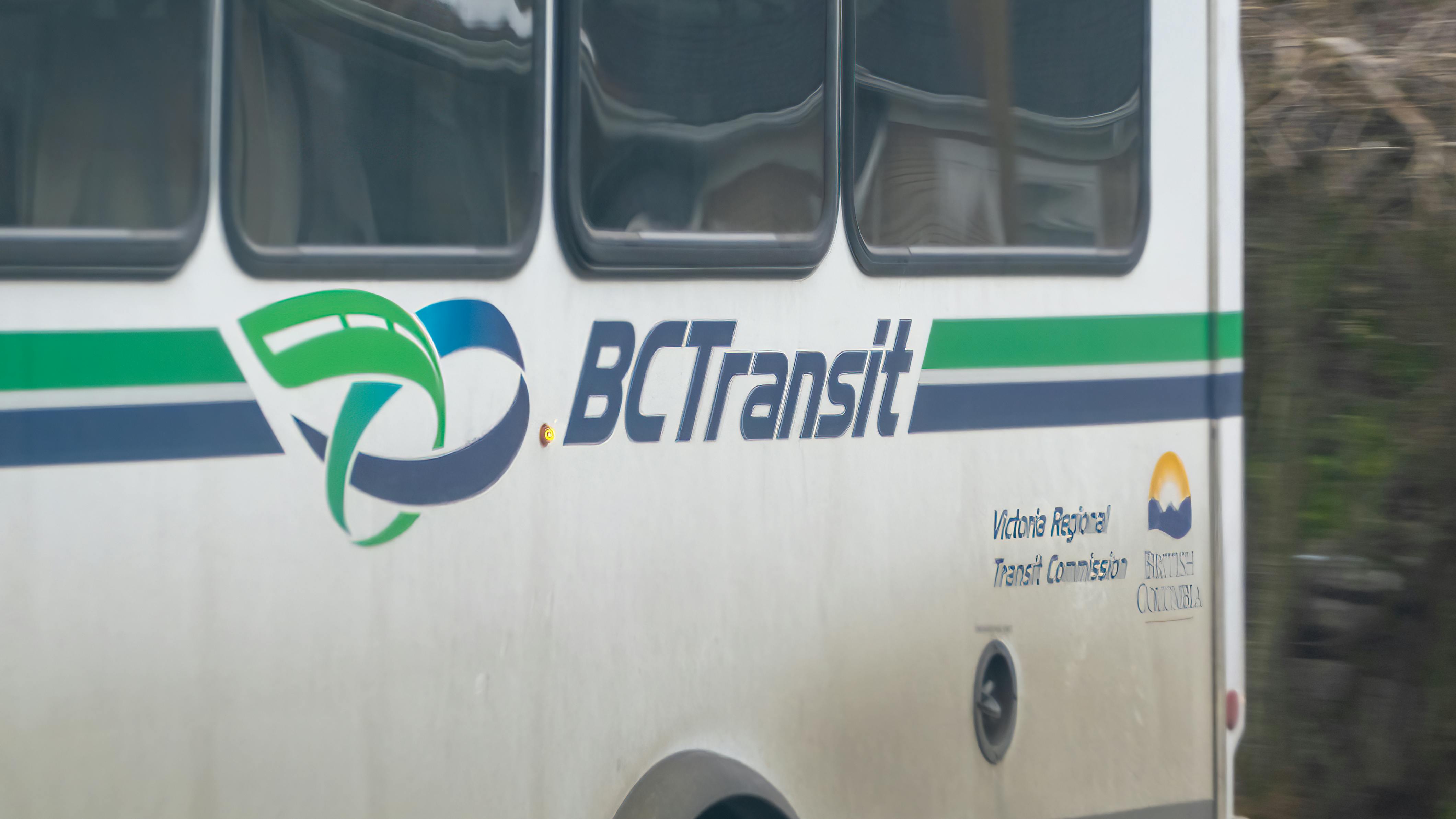 A close up shot of a BC Transit bus logo.