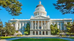 The image shows the California State Capitol building. The image shows the California State Capitol building.