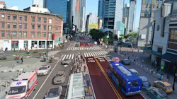 A rendering of a redesigned Flatbush Avenue and Fourth Avenue, in Brooklyn, N.Y., with center-running bus lanes and a concrete bus boarding island. A rendering of a redesigned Flatbush Avenue and Fourth Avenue, in Brooklyn, N.Y., with center-running bus lanes and a concrete bus boarding island.
