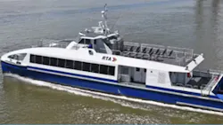 An NORTA ferry travels on the water. An NORTA ferry travels on the water.