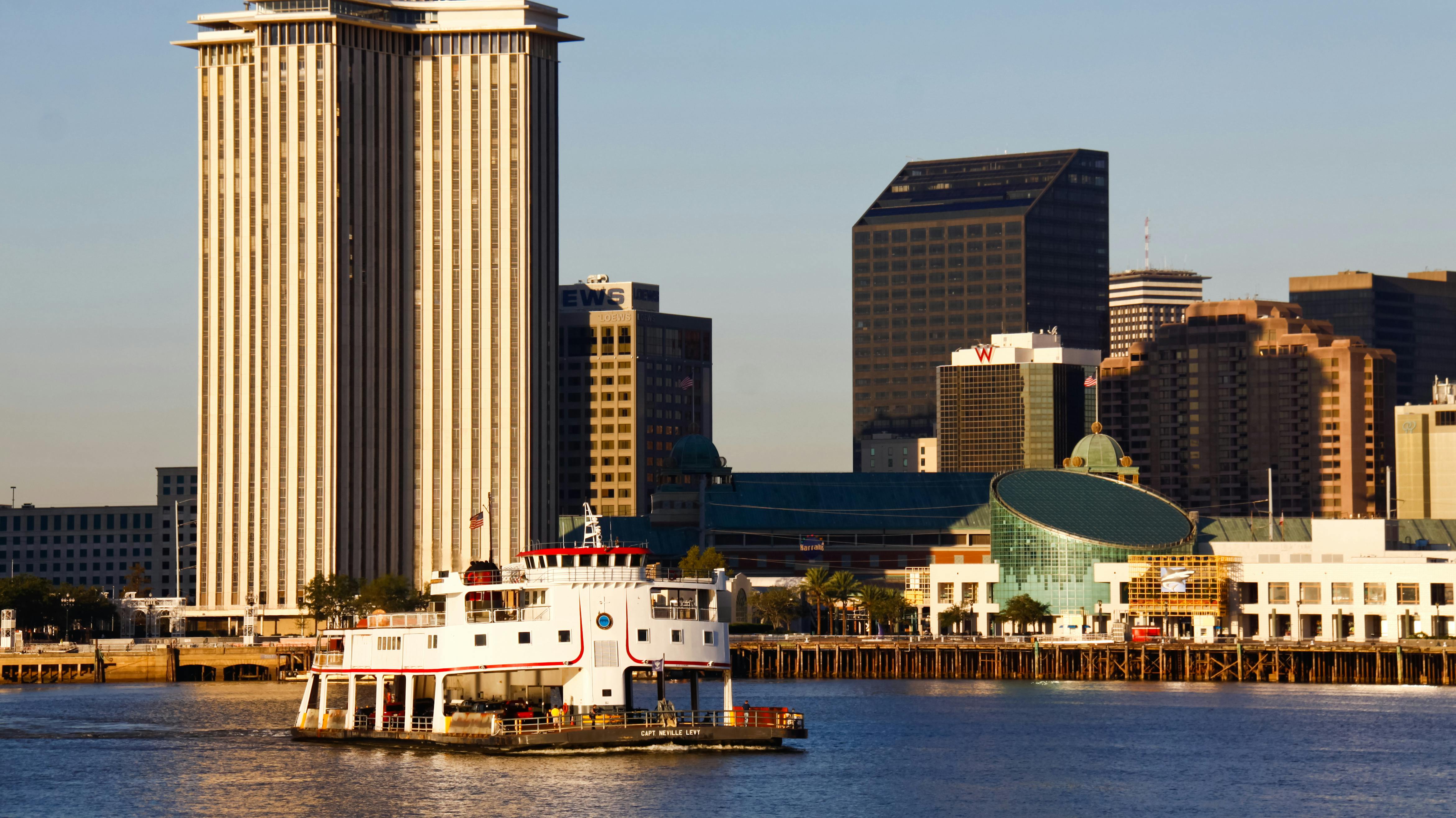 The Algiers Ferry traverses the Mississippi River.