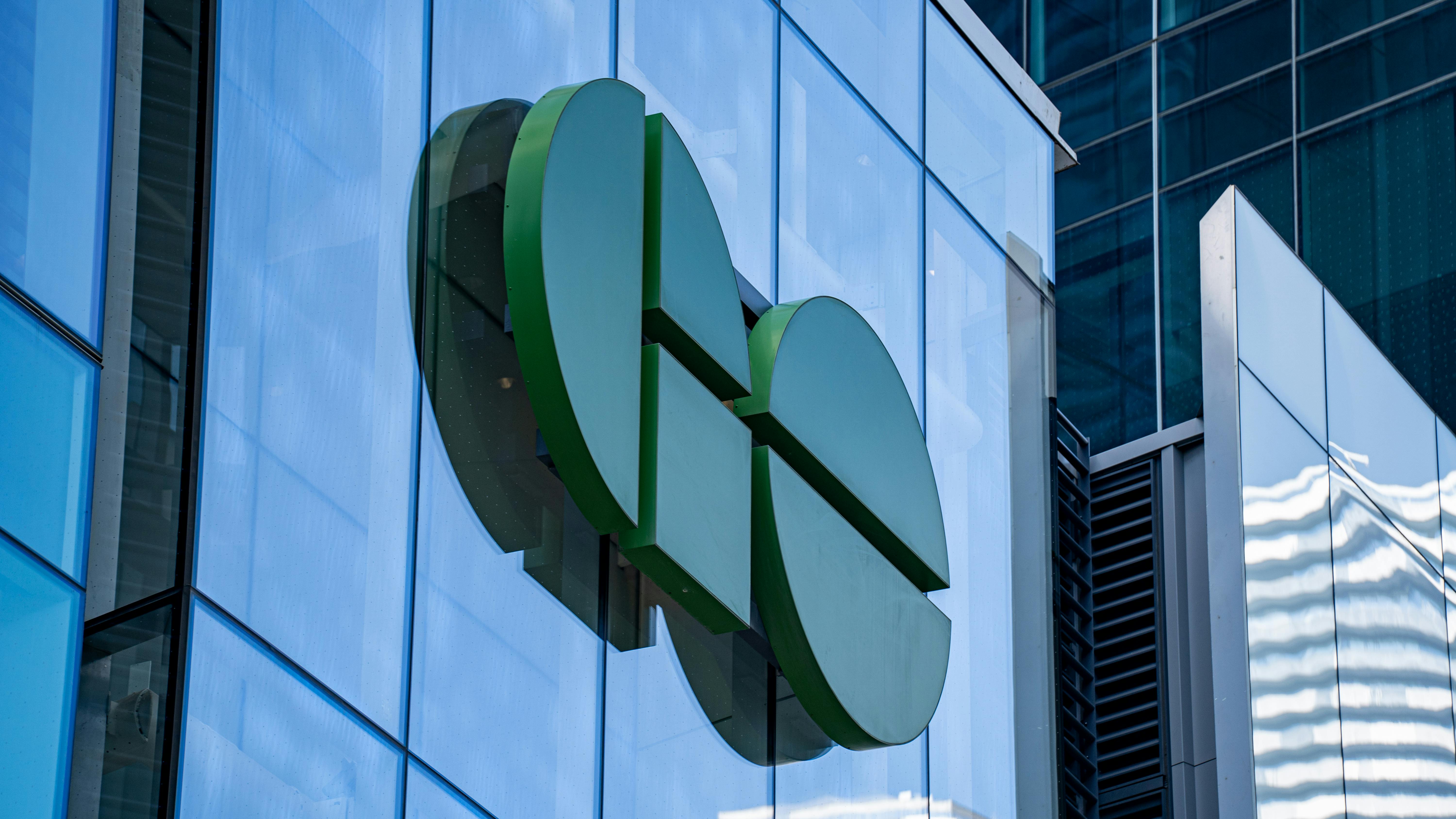 The GO Transit logo on a building facade.