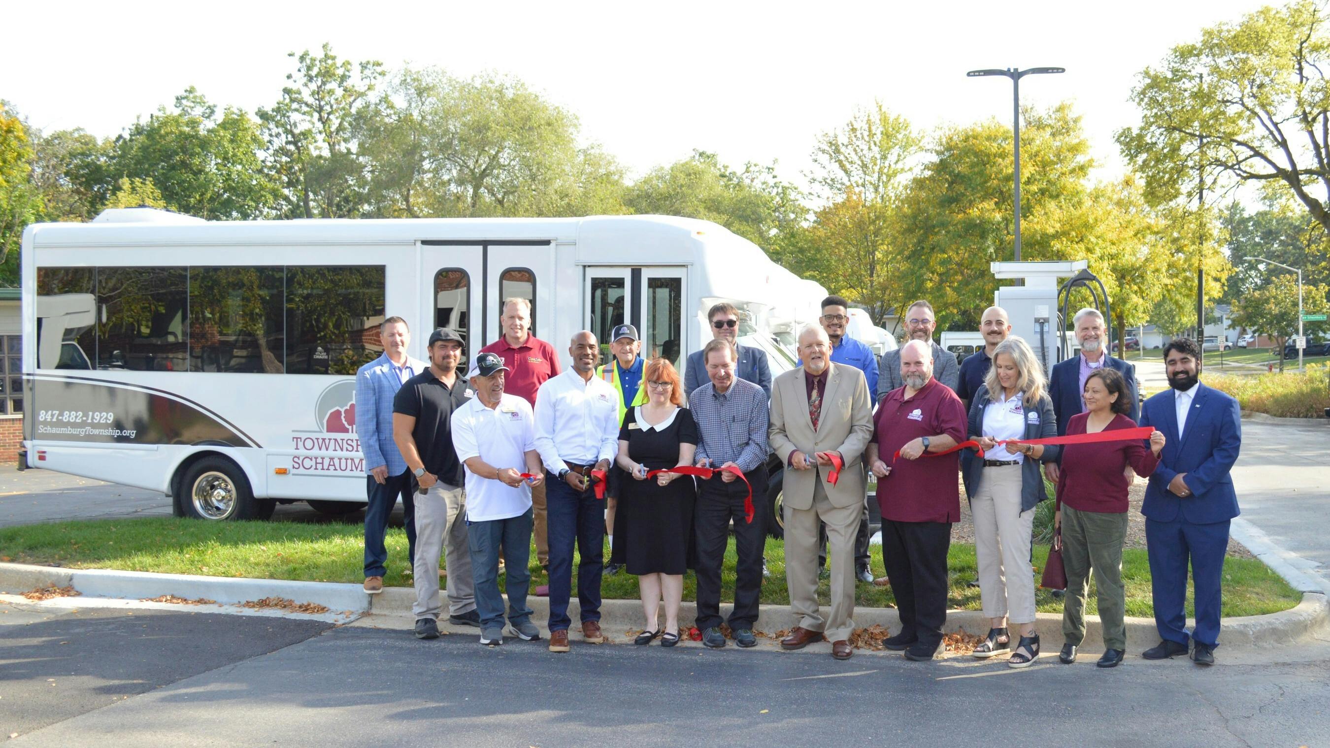 Ribbon-cutting at Township of Schaumburg for the EV paratransit bus project.
