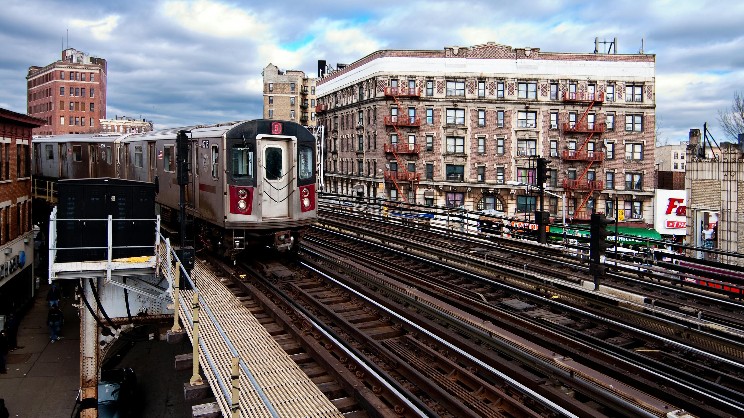 NYC Subway train riding through the Bronx.