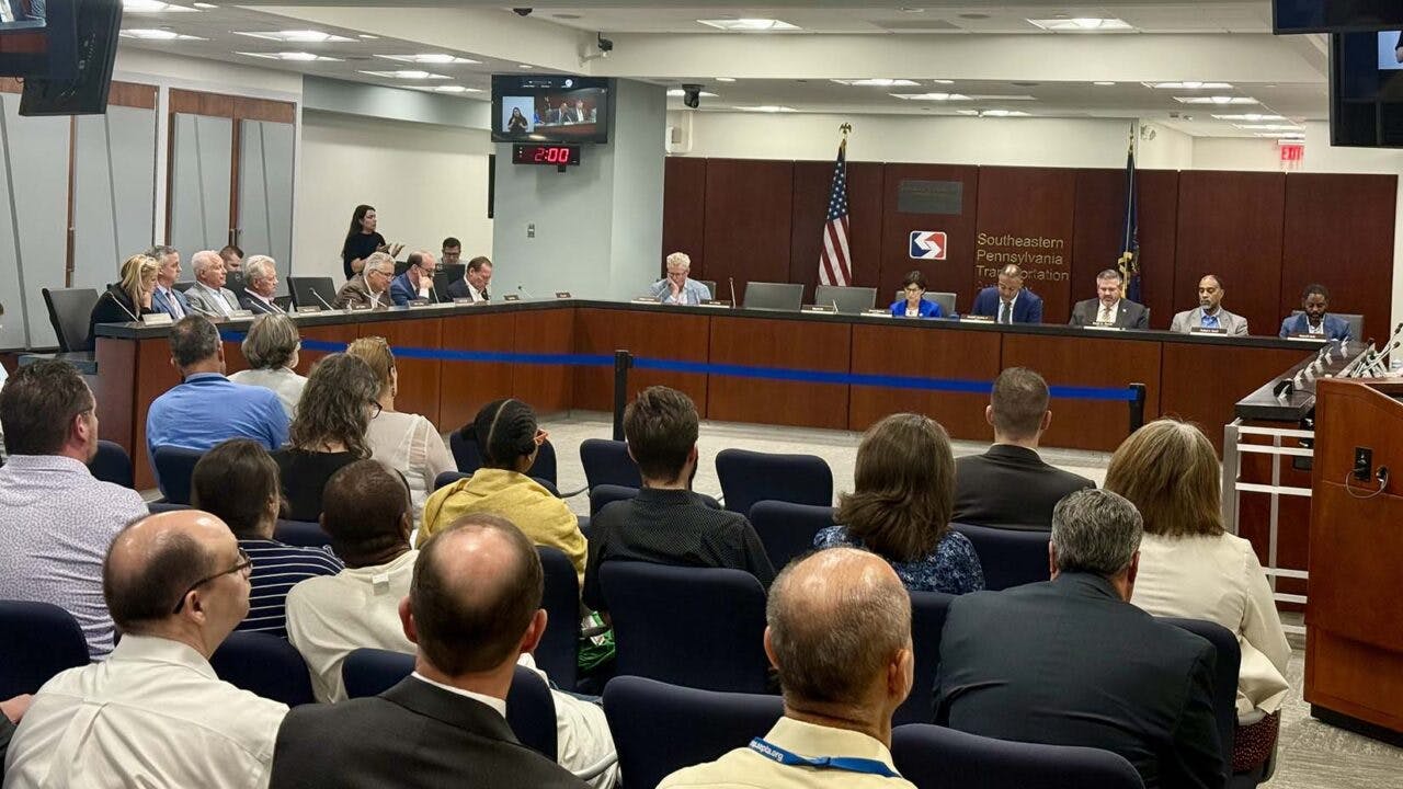 The SEPTA board sits before an audience.