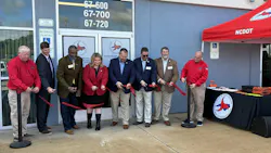 Area leaders cut the ribbon on the new management facility. Area leaders cut the ribbon on the new management facility.