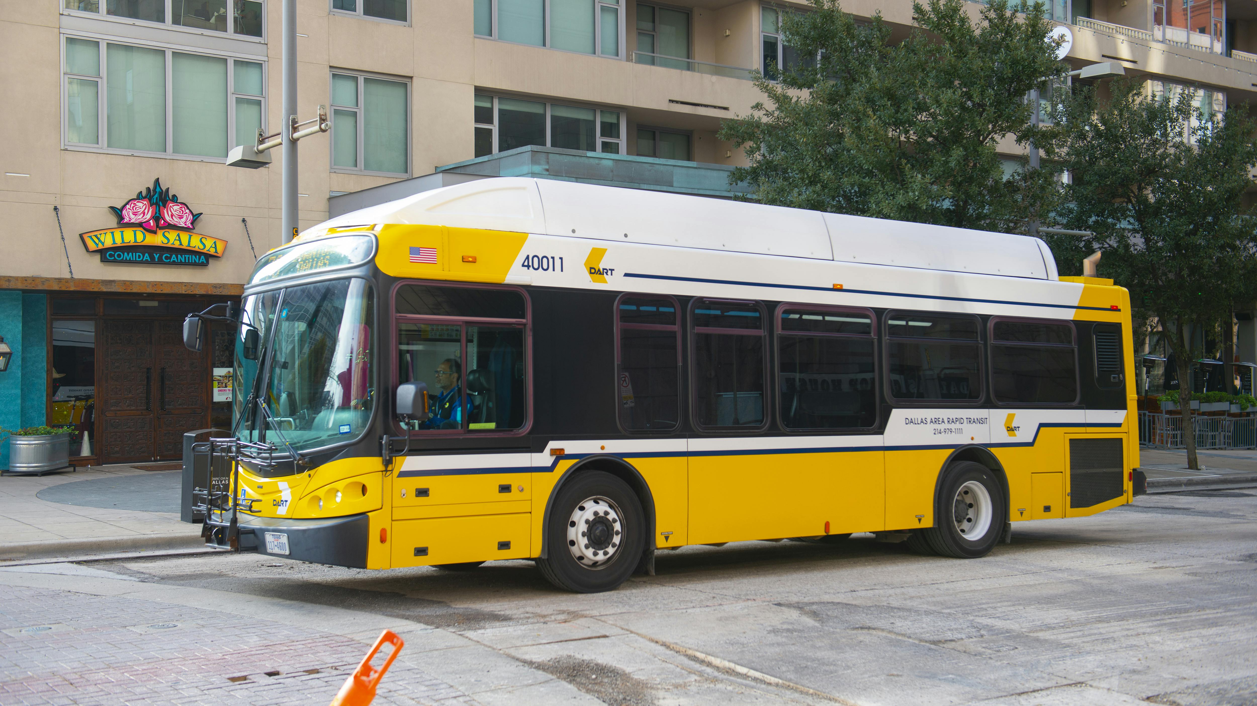 A DART bus drives down a street in Dallas.