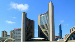 The image shows Toronto City Hall. The image shows Toronto City Hall.