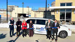 Local leaders gathered to cut a ribbon in front of a new VanGo van. Local leaders gathered to cut a ribbon in front of a new VanGo van.