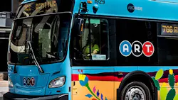 An ABQ Ride bus moves down the street. An ABQ Ride bus moves down the street.