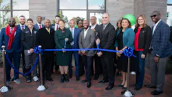 Local leaders gather to cut the ribbon on the new development. Local leaders gather to cut the ribbon on the new development.