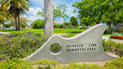 The image shows the sign of the Maurice Gibb Memorial Park, the terminal on the Miami Beach side of the water. The image shows the sign of the Maurice Gibb Memorial Park, the terminal on the Miami Beach side of the water.