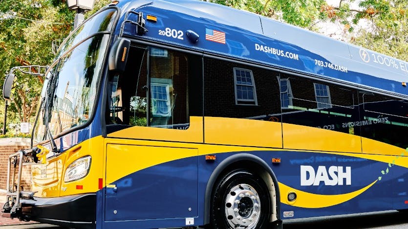 A DASH electric bus drives by.