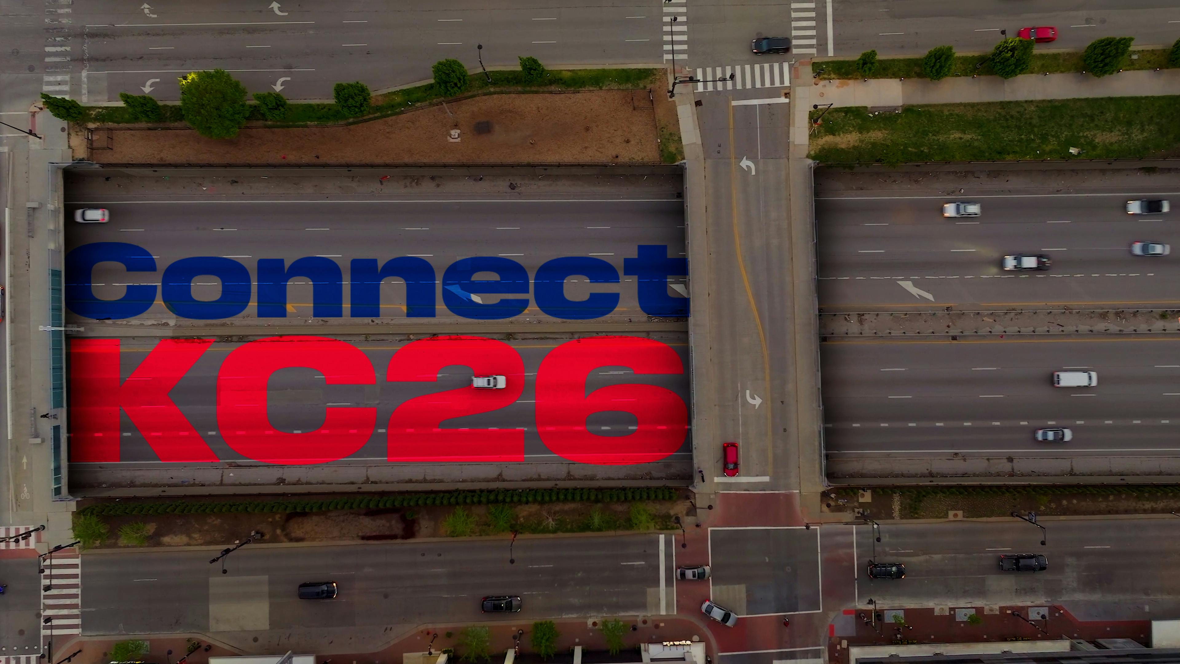 The image displays the Connect KC26 logo imposed over an express way.