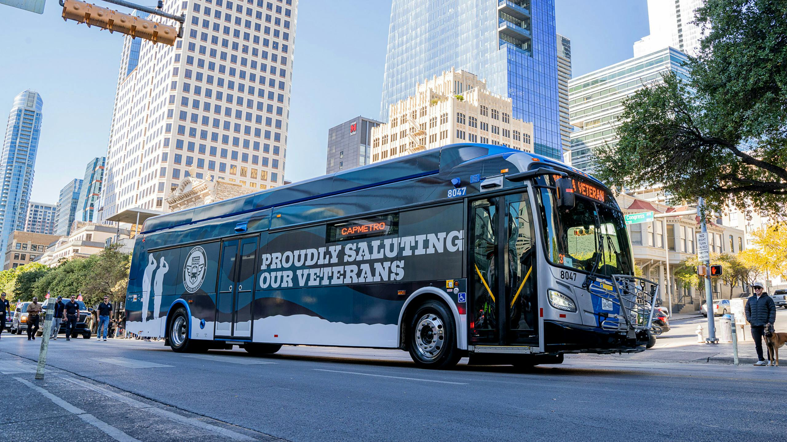 A CapMetro bus drives down the street.