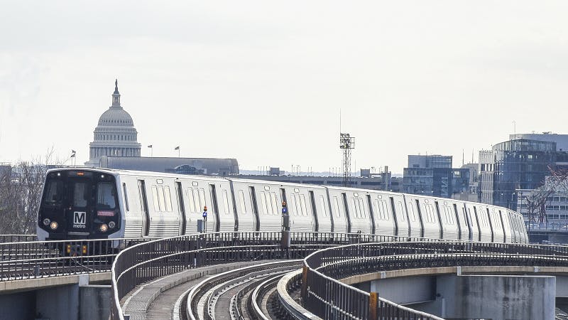 A 7000-series rail set moves down the track.
