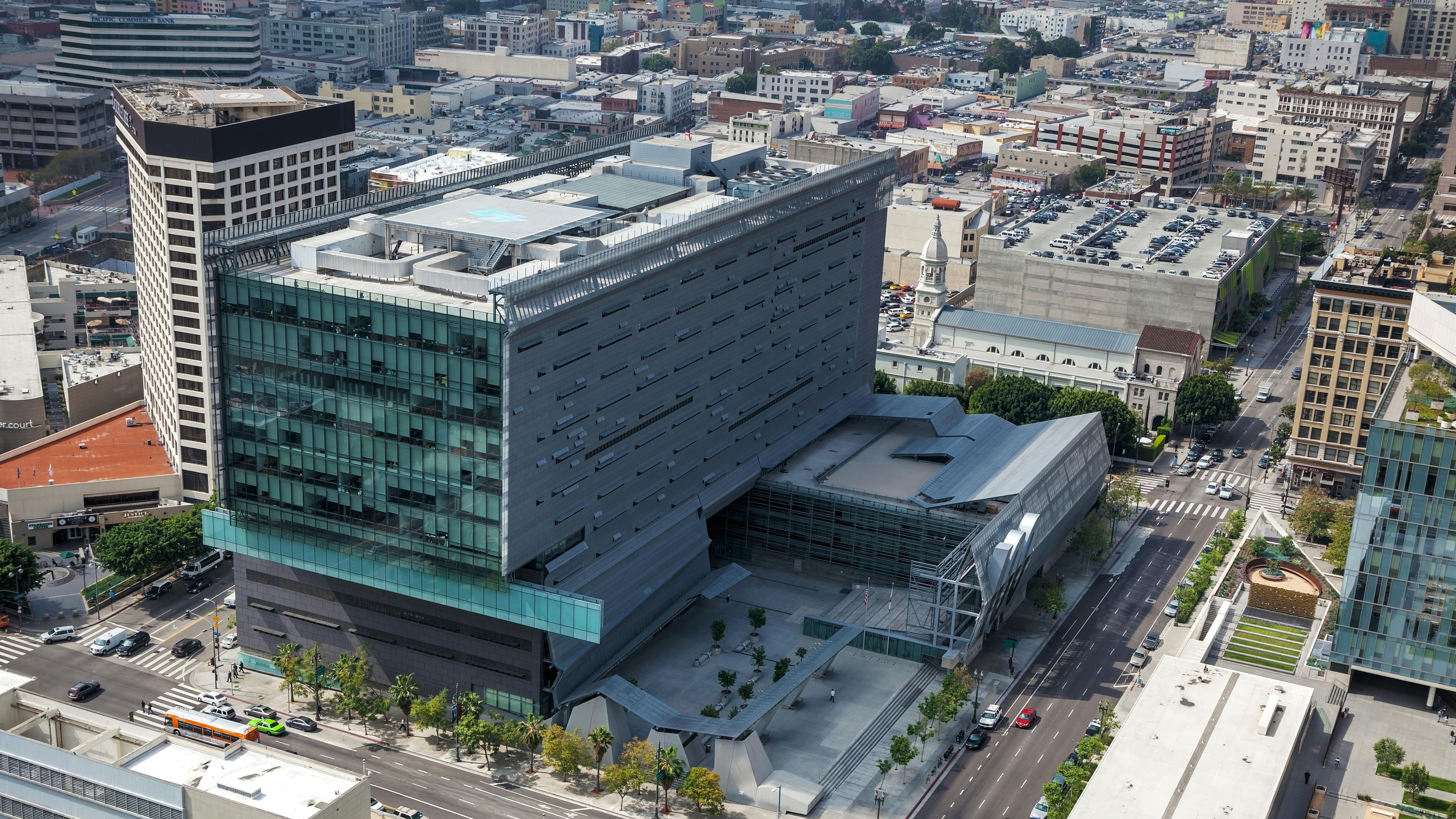 The image shows the Caltrans building from an arial view.