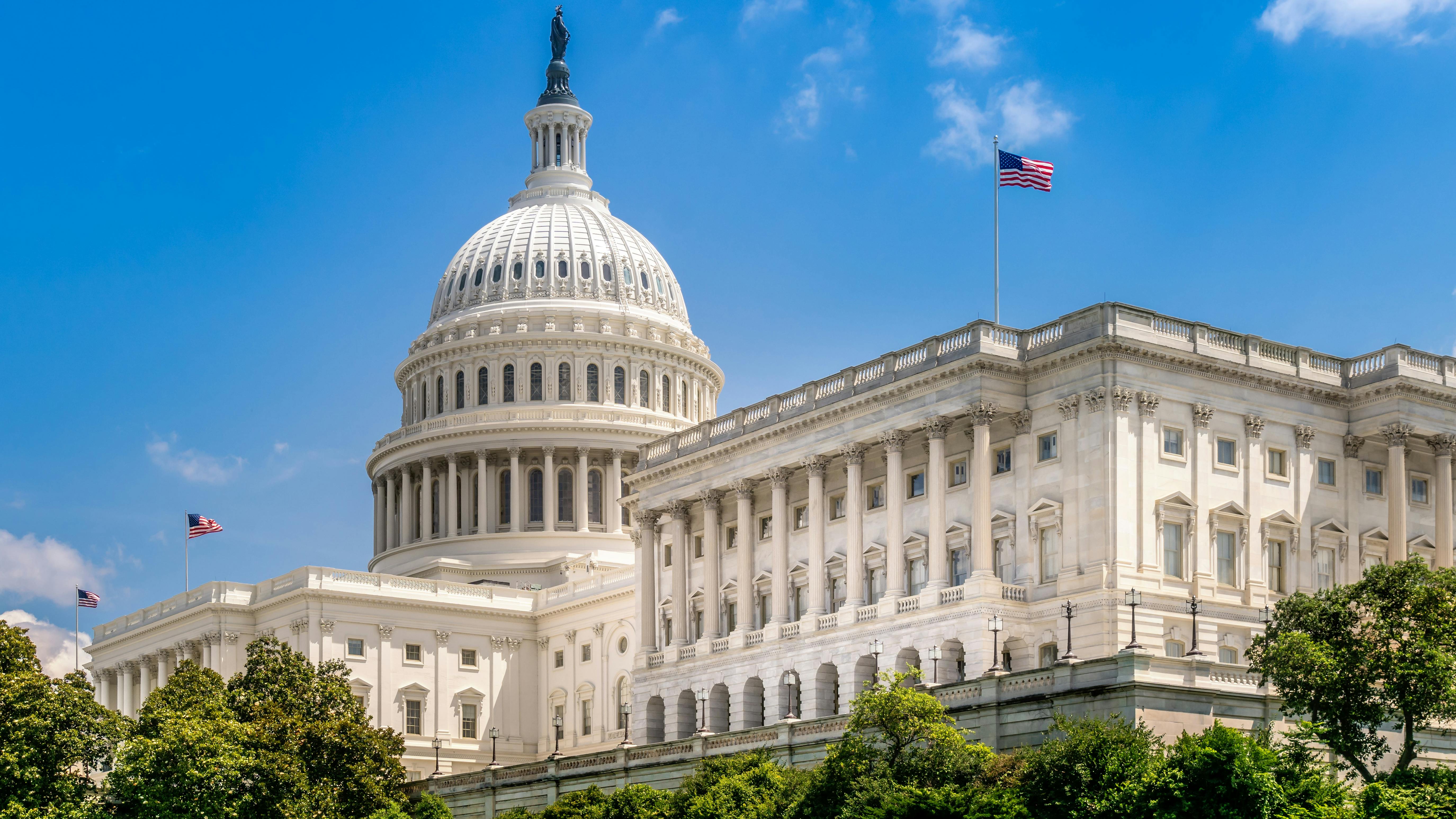The image shows an off-angle shot of the the U.S. Capitol building.