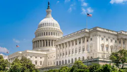The image shows an off-angle shot of the the U.S. Capitol building. The image shows an off-angle shot of the the U.S. Capitol building.
