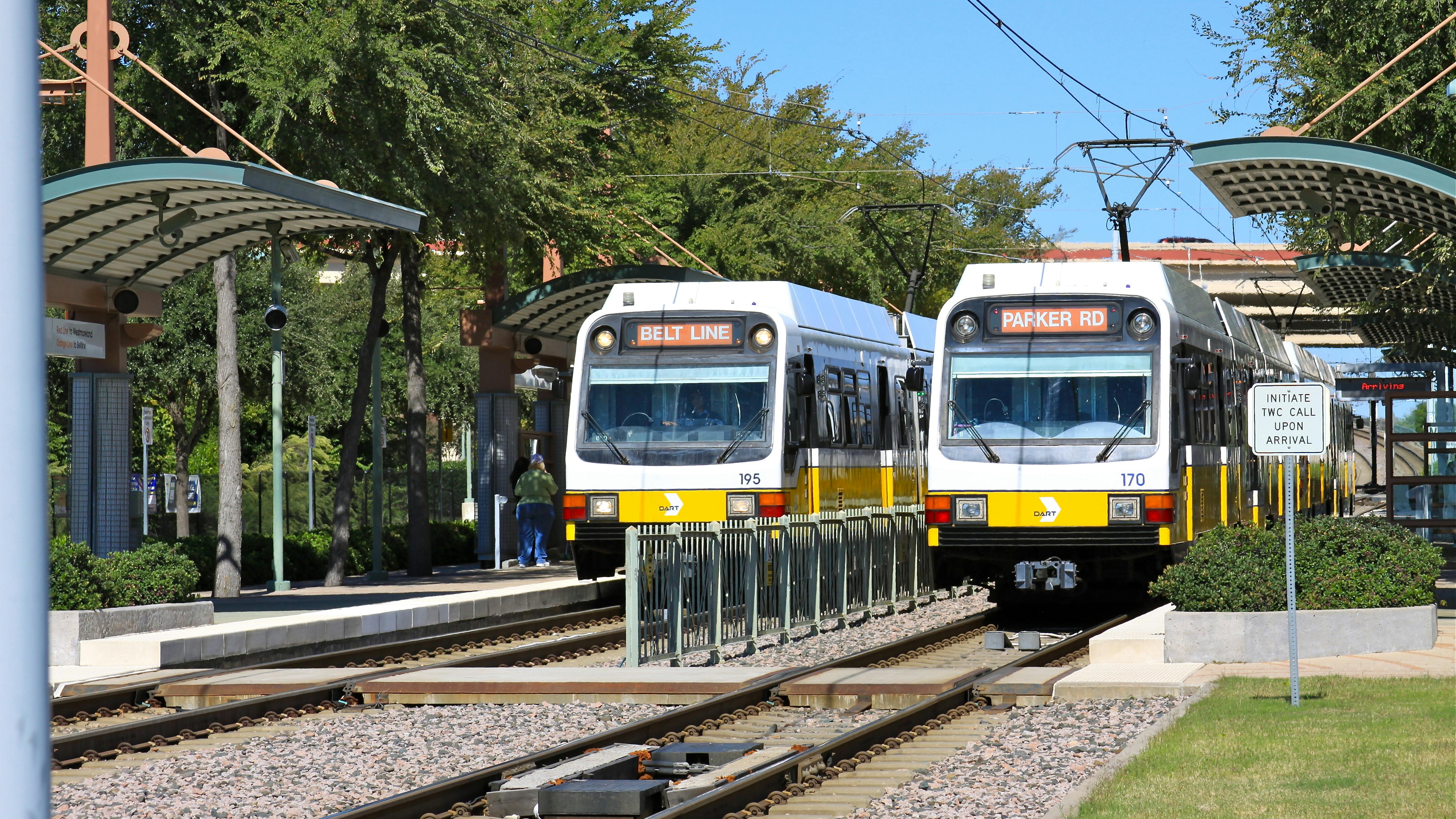 DART trains sit at a station.