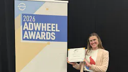Megan Perrero, LIT Marketing and Communications Committee Chair, holds the award next to a 2026 AdWheel Awards banner. Megan Perrero, LIT Marketing and Communications Committee Chair, holds the award next to a 2026 AdWheel Awards banner.