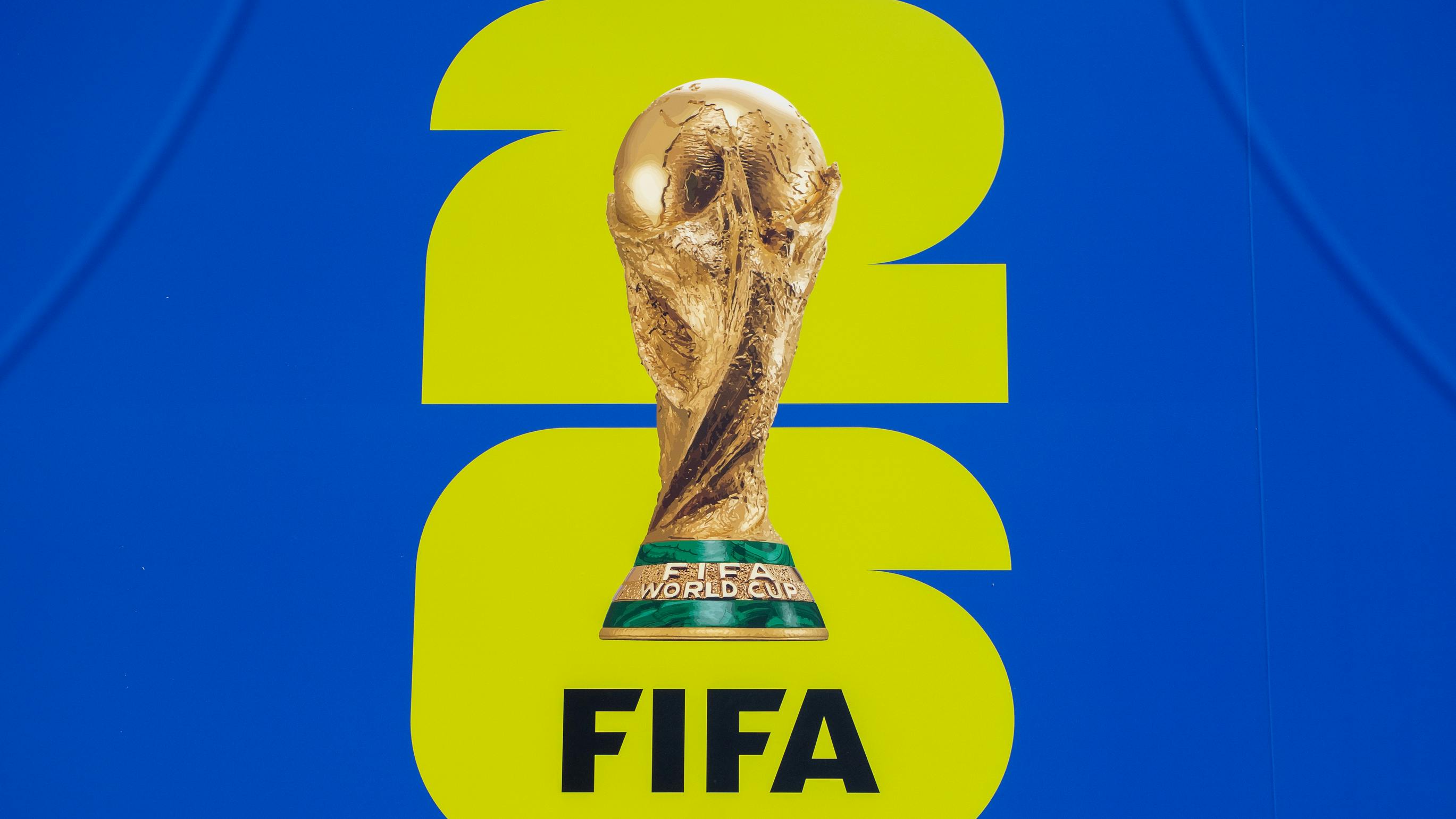 The official FIFA World Cup 2026 logo featuring trophy and '26' design.