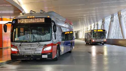 Two SamTrans buses. Two SamTrans buses.
