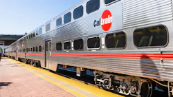 A Caltrain train car sits at a station. A Caltrain train car sits at a station.
