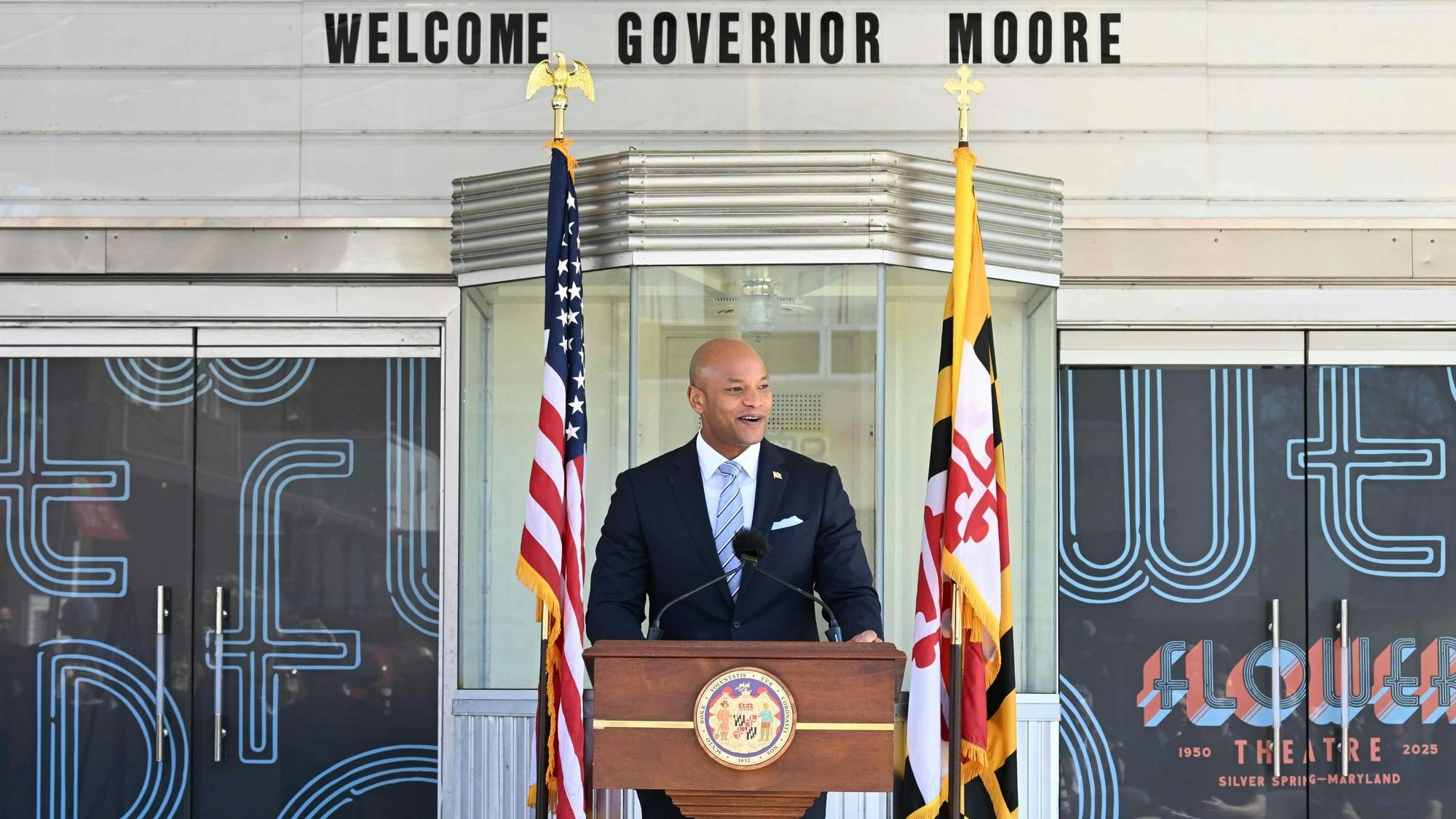 Maryland governor Wes Moore stands at a podium speaking.