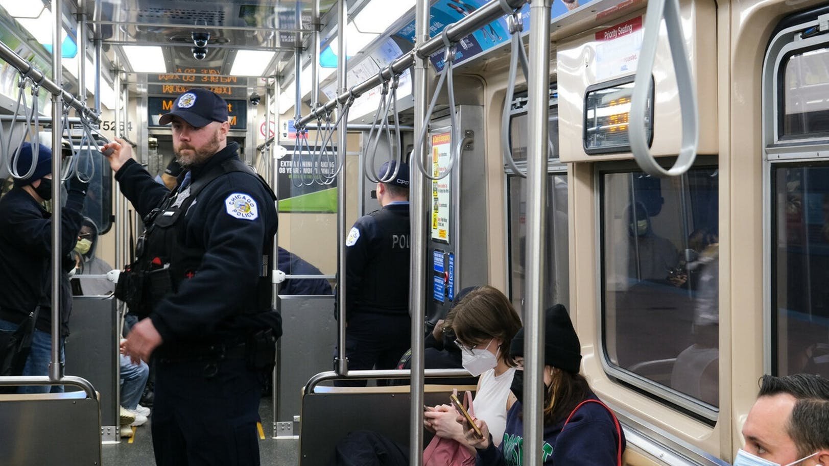 Police officers on a CTA train.