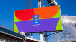 The image shows the FIFA World Cup 2026 Toronto logo on a stadium screen. The image shows the FIFA World Cup 2026 Toronto logo on a stadium screen.