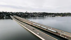 The image shows the new Crosslake Connection bridge over the water. The image shows the new Crosslake Connection bridge over the water.