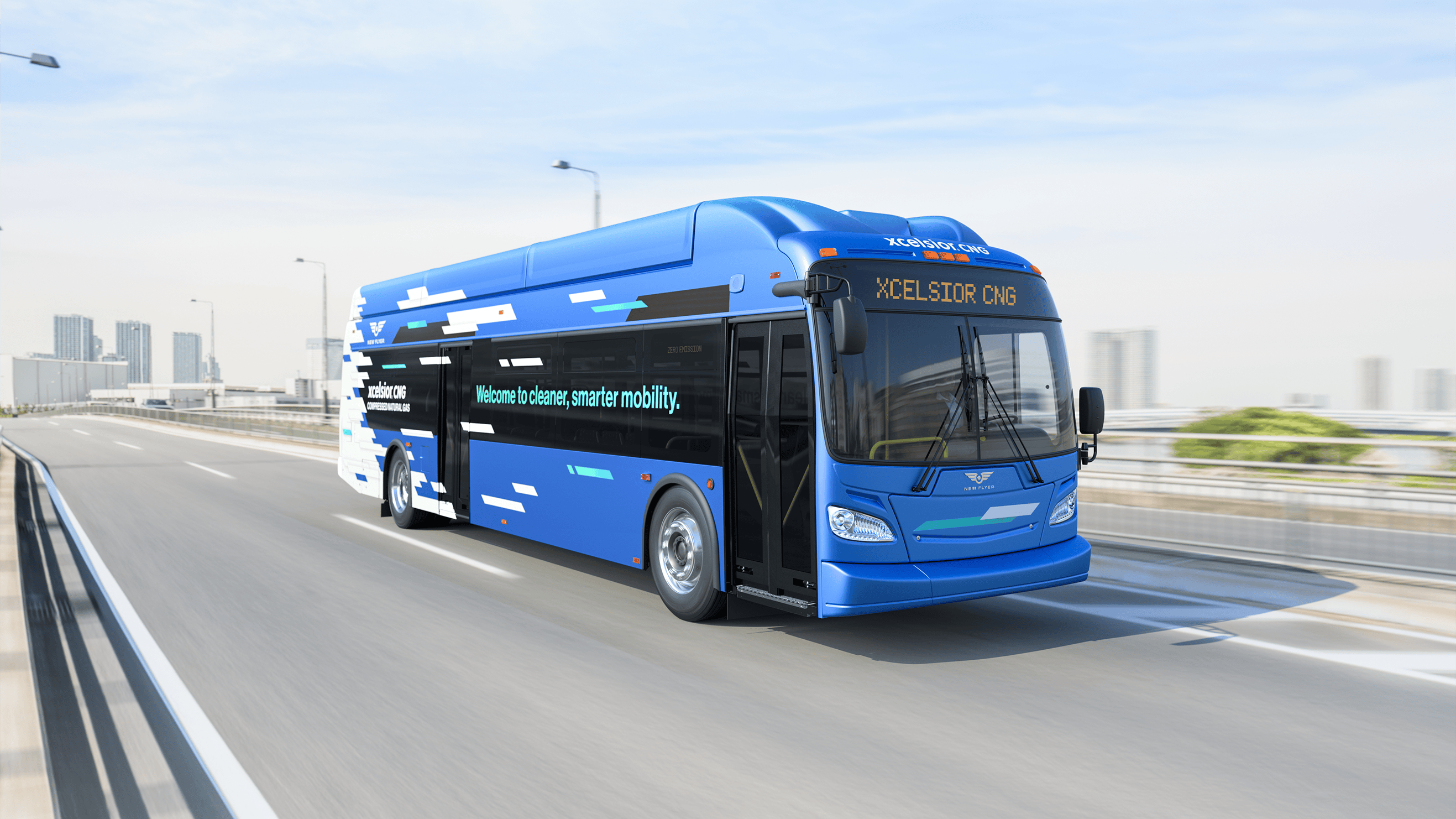 A New Flyer Xcelsior CNG compressed natural gas transit bus rendered in a promotional image, traveling on an elevated highway with a blurred urban skyline in the background. The bus features a bold blue and black livery with a fragmented geometric graphic pattern along the side and the text 'Welcome to cleaner, smarter mobility.' The destination sign reads 'XCELSIOR CNG' and the New Flyer logo is visible on the front fascia. Compressed natural gas storage tanks are visible on the roof.