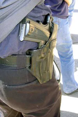 Carry enough gun. Full-sized Kimber SIS pistol in high ride strong-side holster conceals well under loose fitting shirt. Carry enough gun. Full-sized Kimber SIS pistol in high ride strong-side holster conceals well under loose fitting shirt.