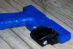 The X5L mounted on a Glock 17 blue gun