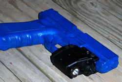 The X5L mounted on a Glock 17 blue gun The X5L mounted on a Glock 17 blue gun