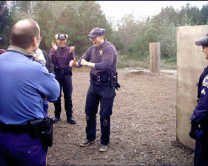 Alaska State Trooper Sgt. Rick Roberts shares in some fun with recruits.