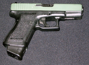 2nd generation Glock Model 19 w/ Duracoated slide & XS Sights. 15K rounds and still going strong!