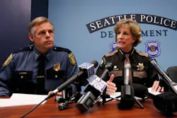 King Count Sheriff Sue Rahr, center, addresses a news conference with Seattle Police Department Assistant Chief Mike Sanford, left. King Count Sheriff Sue Rahr, center, addresses a news conference with Seattle Police Department Assistant Chief Mike Sanford, left.