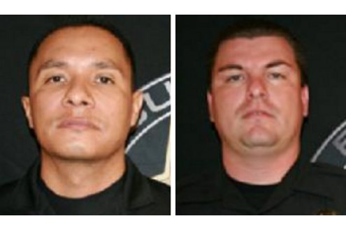 Officer Rolando Tirado, left, and Officer Christopher Paz