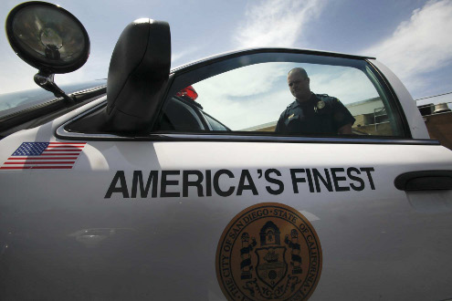 San Diego officers at the Northern Division office in La Jolla begin their day.
