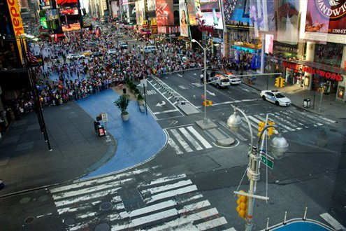 Times Square is evacuated by police after a suspicious suitcase is found at a telephone booth on Broadway.