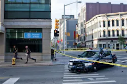 A Grand Rapids police car that was both hit and fired upon sits on the corner of Division and Fulton in Grand Rapids. A Grand Rapids police car that was both hit and fired upon sits on the corner of Division and Fulton in Grand Rapids.